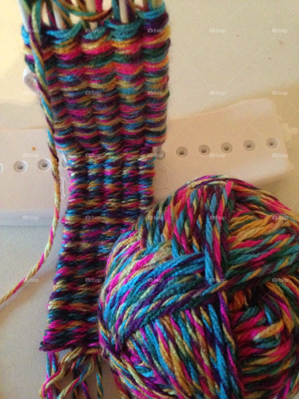 Colors of knitting. Knitting yarn and beginning of project