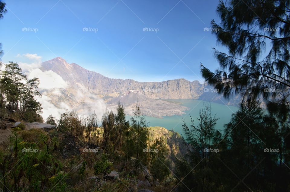 Beautiful nature background Segara Anak Lake. Mount Rinjani is an active volcano in Lombok, indonesia. Soft focus due to long exposure.