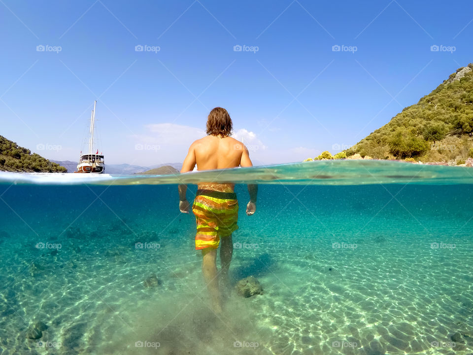 Walking in turquoise water