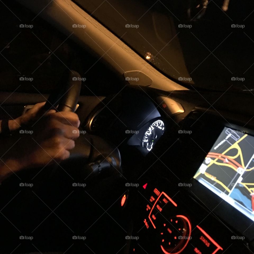 Using GPS, see steering inside darkened car cockpit! Getting us there safely, he loves me.