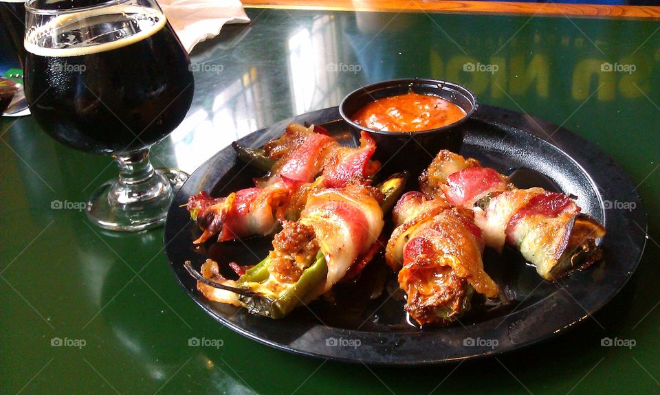 Bacon wrapped jalapenos and a good stout