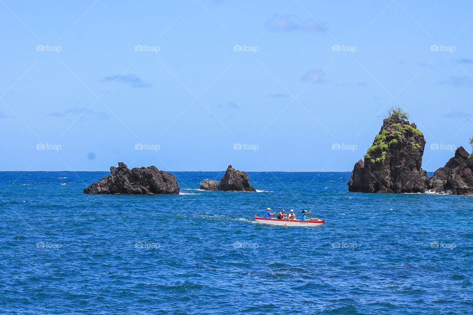 Rowing team on the ocean