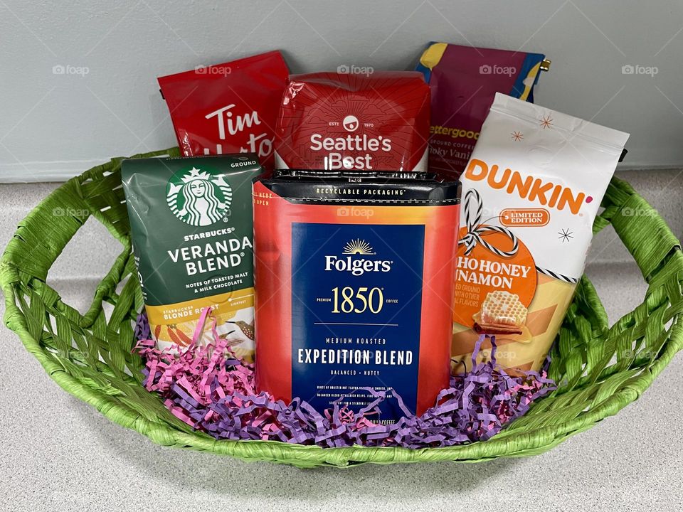 Gift basket full of coffee, getting caffeinated for Christmas, basket of holiday cheer, delicious coffees for the holidays 