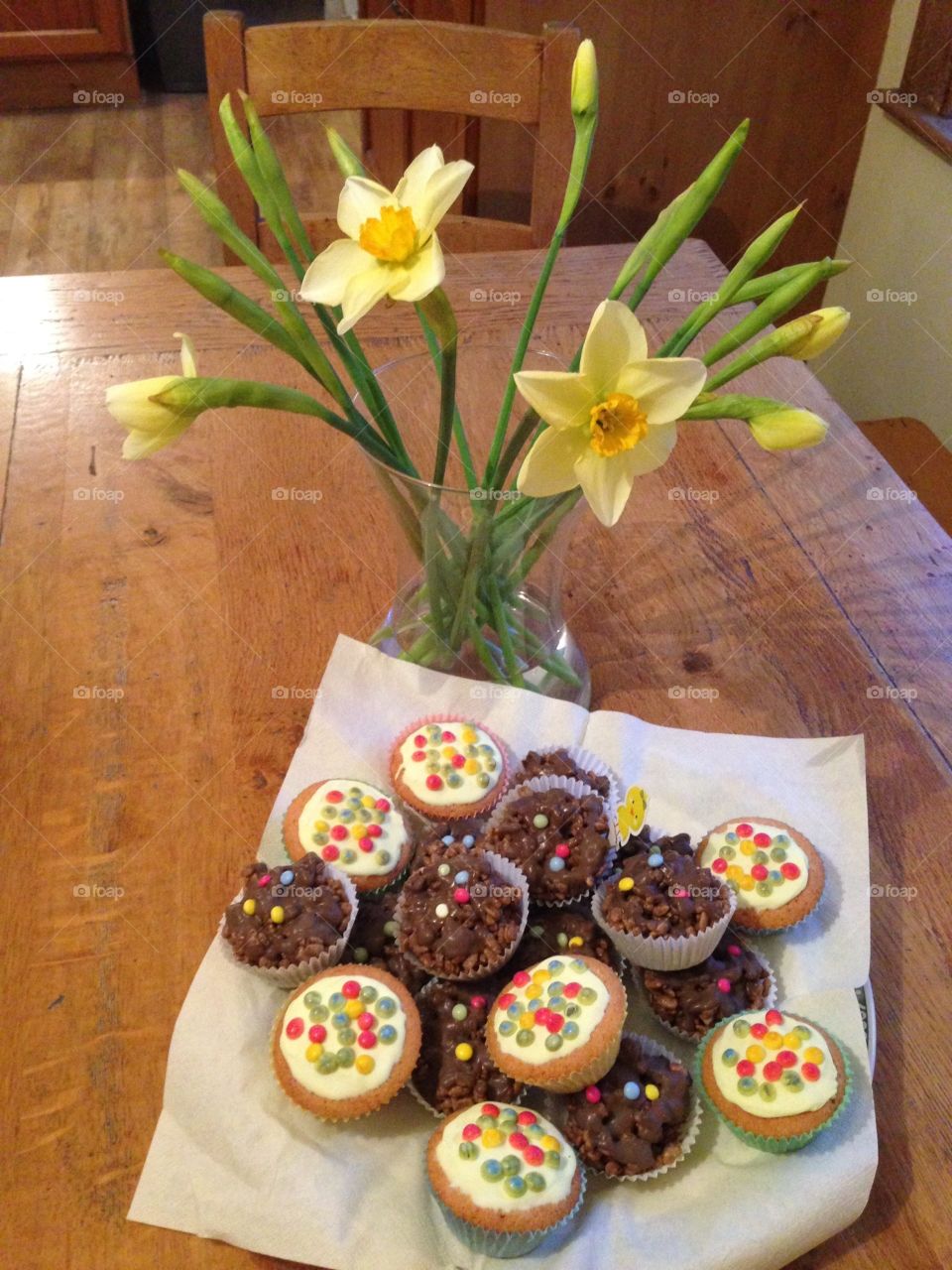 Yellow flowers and cakes