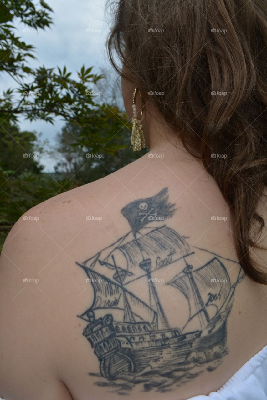 Pirate Ship Tattoo on Woman's Shoulder, Ink Art
