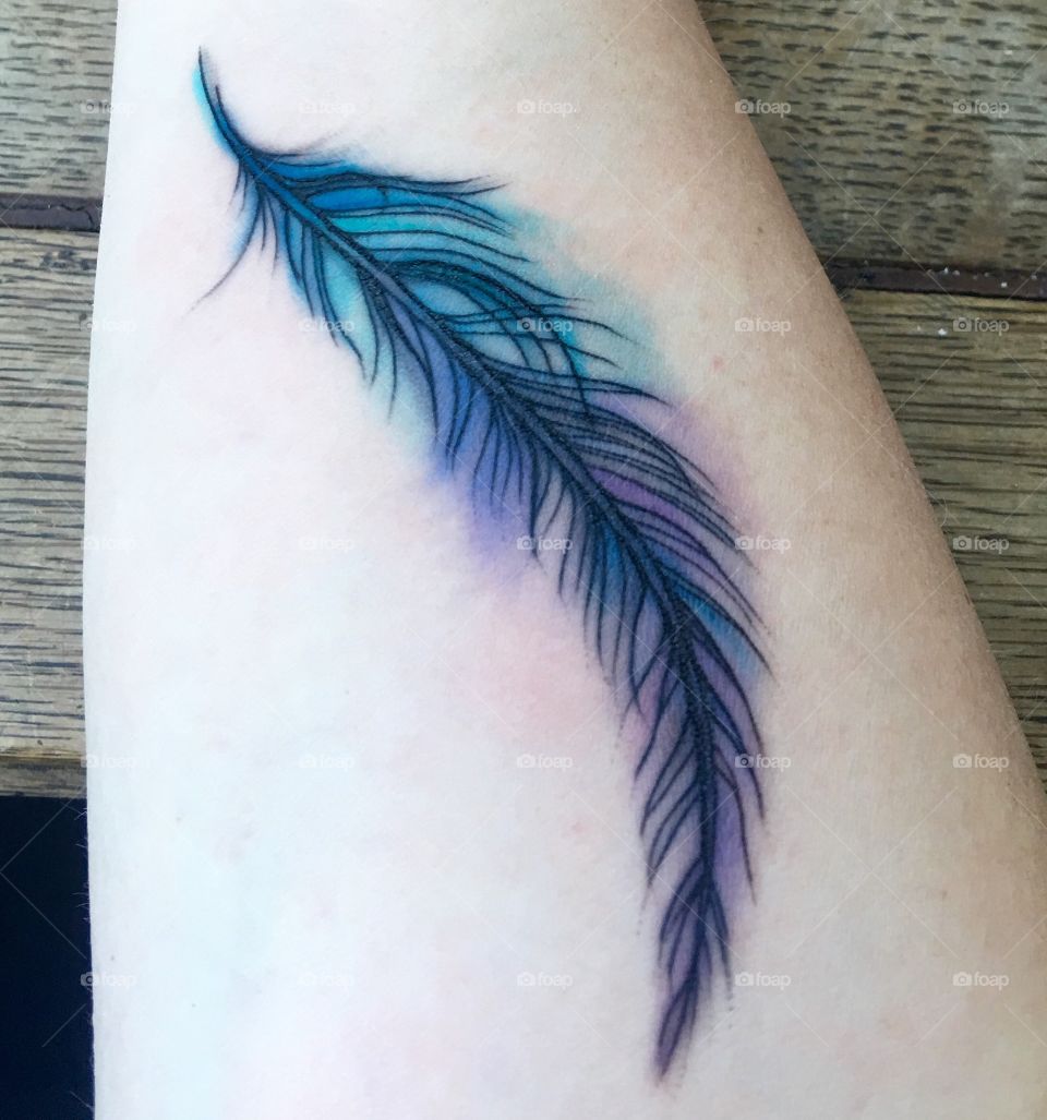 My arm tattoo of a beautiful watercolor feather