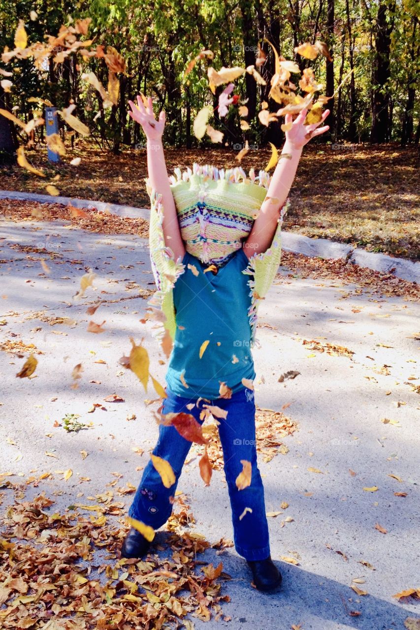 Watching children playing outside in the leaves during a nice warm fall day makes me very happy!! 