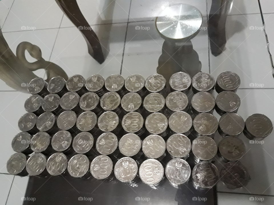 One thousand rupiah coins of five hundred thousand coins
