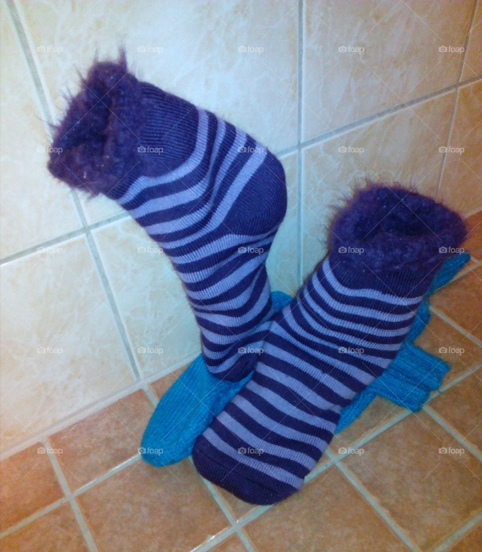 Striped sock on tiptoes by itself