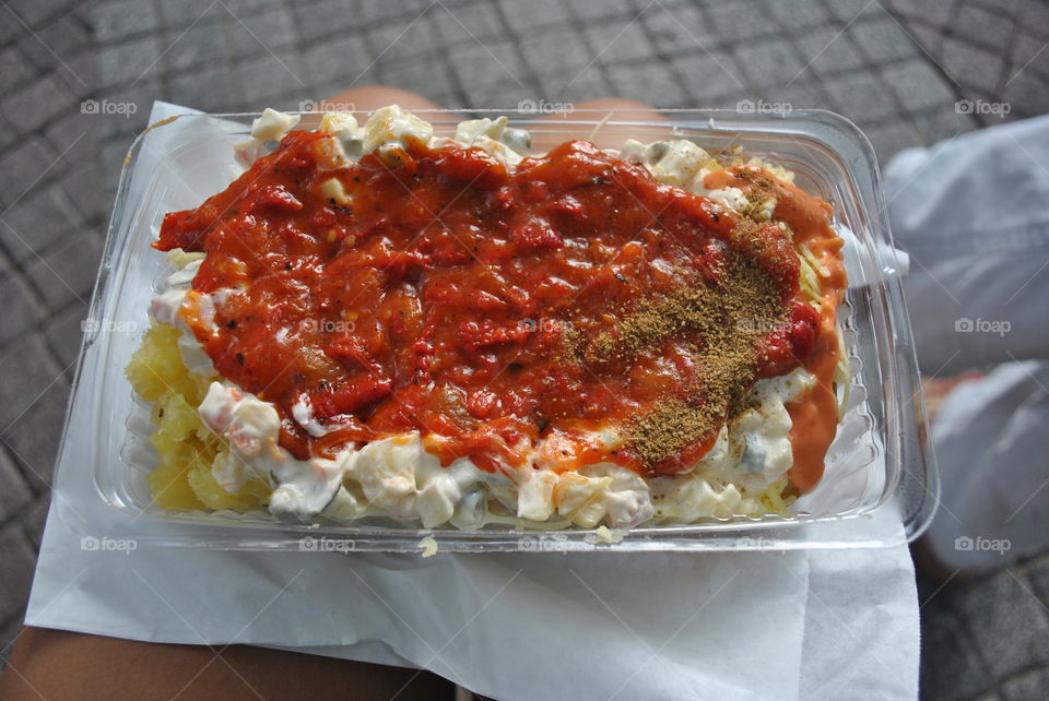 Stuffed potato with salad, cheese, tomato spread in Plovdiv, Bulgaria