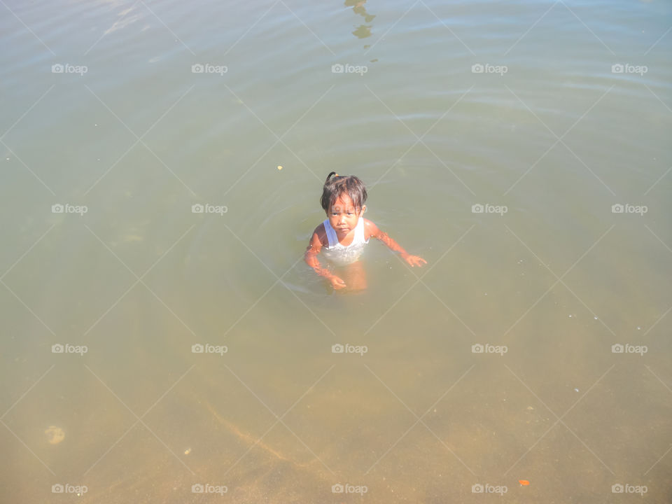 the kid in the water