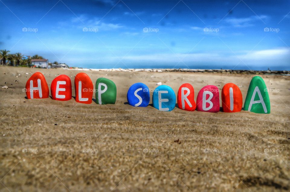 Help Serbia, concept on colorful stones