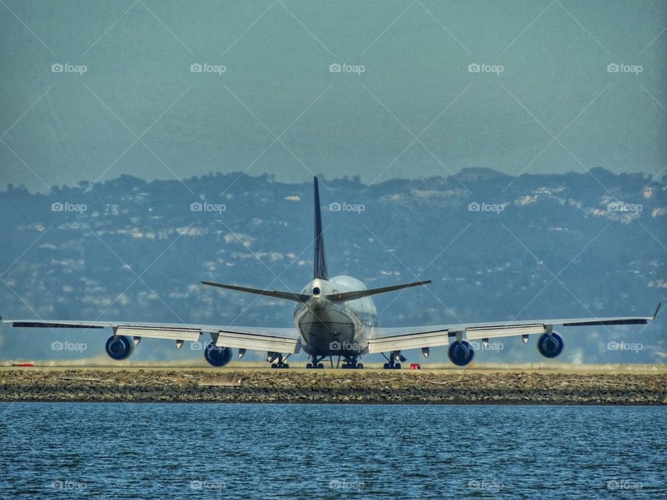 747 Boeing Jumbo Jet Preparing For Takeoff. Jumbo Jet Preparing For Takeoff
