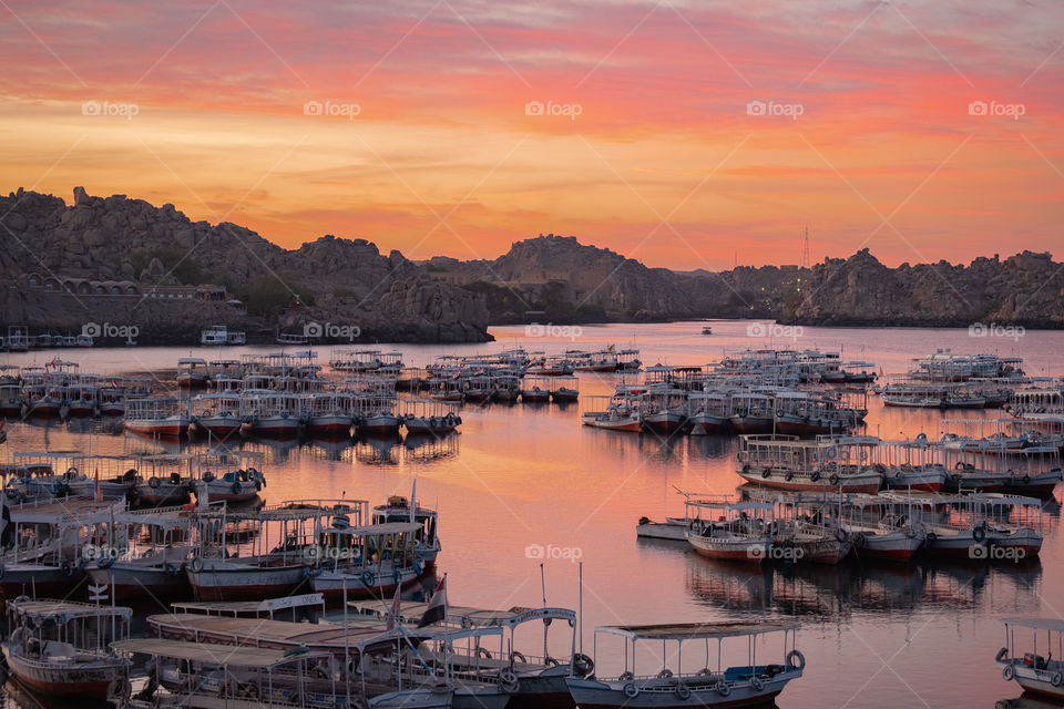 Nice sunrise view on a lot of boats background in Nile river