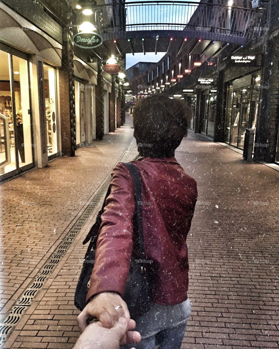 Girl is walking in a lonely streets of Nijmegen