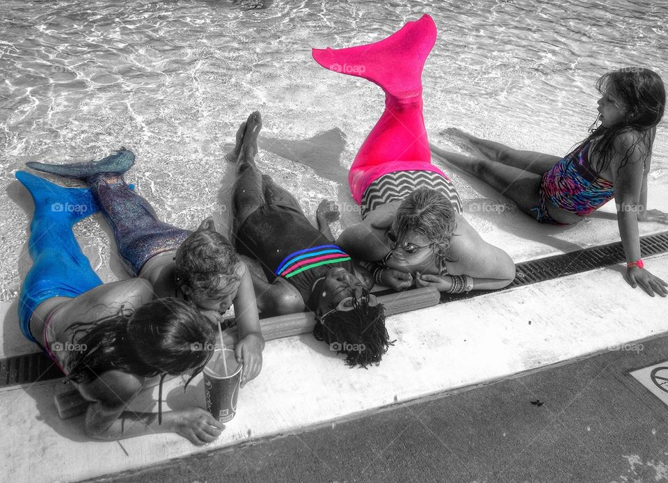 Mermaids at the pool