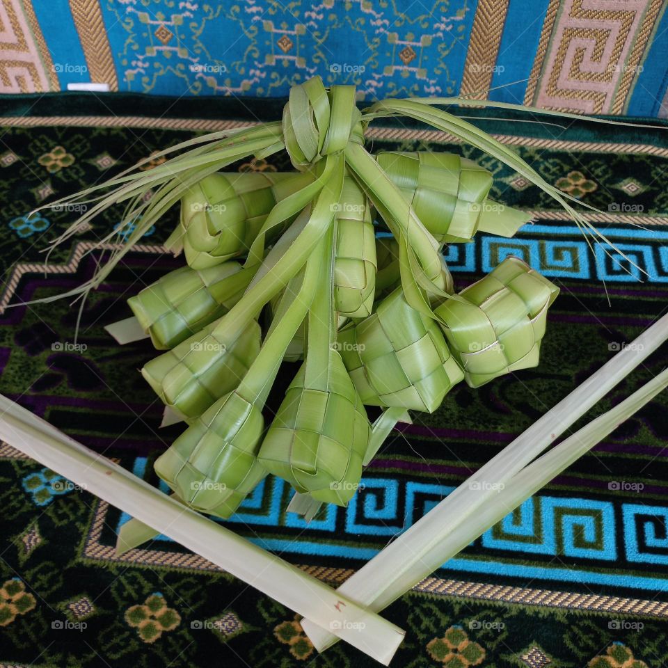 This is called a ketupat where food is often made during the month of Ramadan and holidays