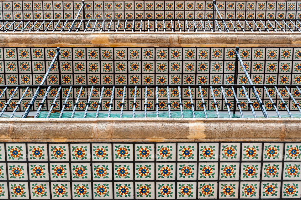 Beautifully tiled balconies. Square floral decorated tiles.