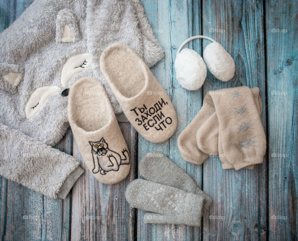 Wool sleepers and warm wear on wooden blue floor