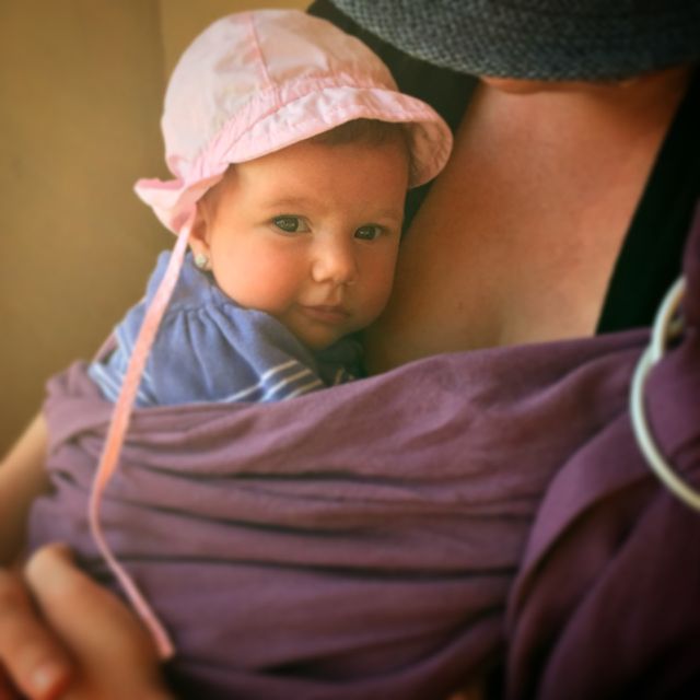 Mother holding 3 months old daughtet. Mother daughter 