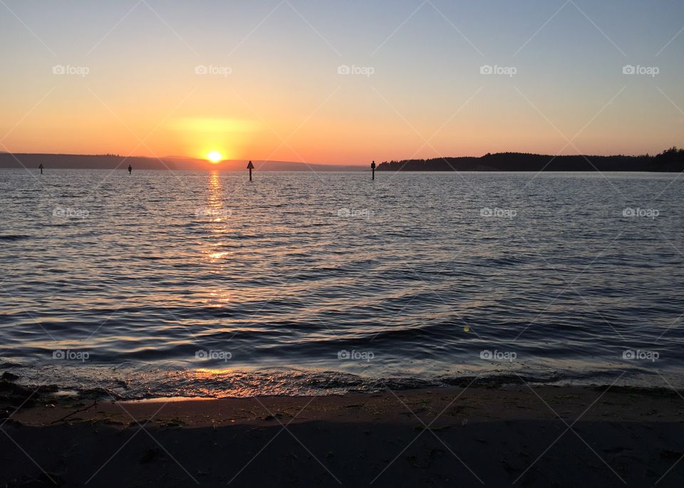 Reflection of sunlight on sea during dusk