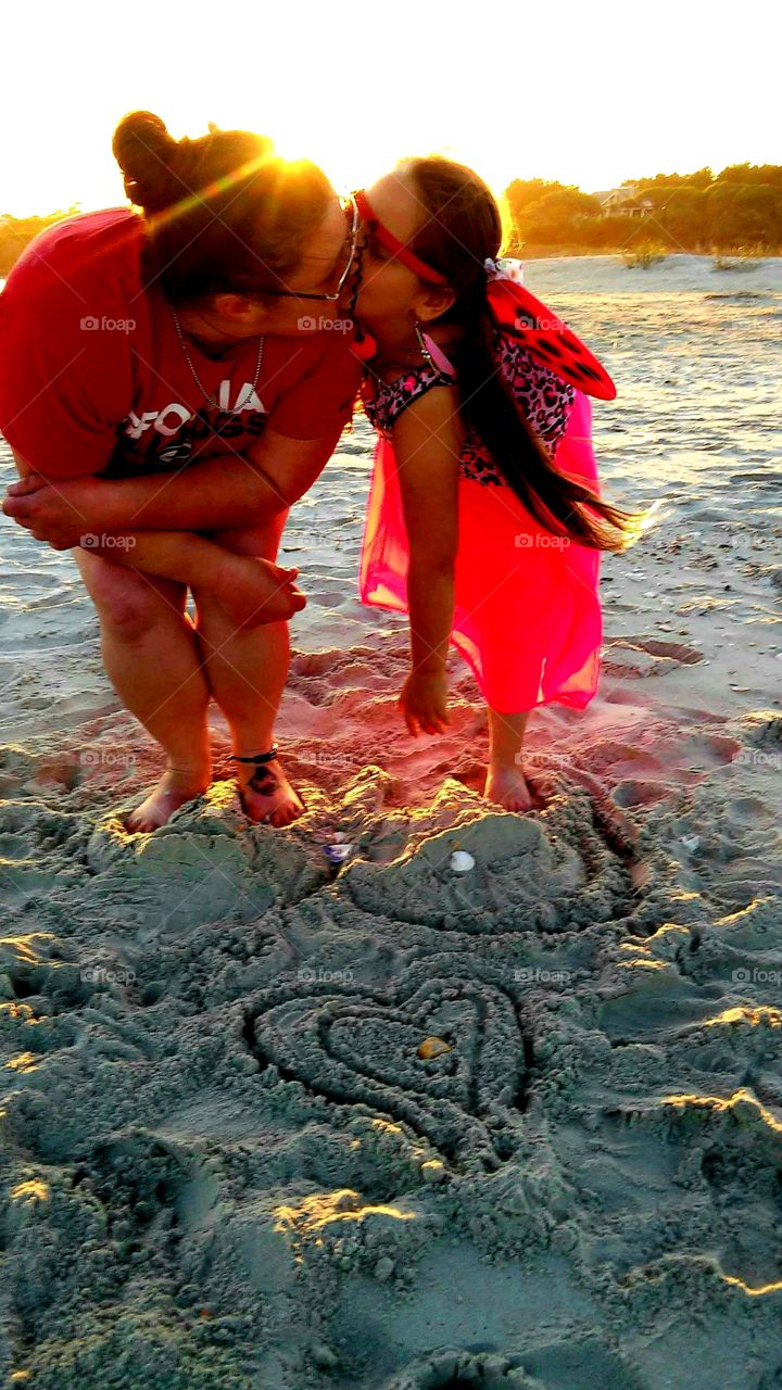 mother and daughter enjoy a day at the beach