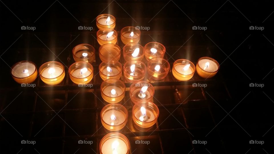 votive candles in a chapel