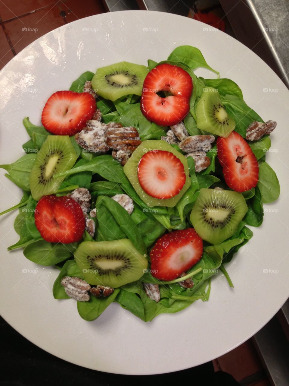 Strawberry Kiwi pecan salad. Food at work