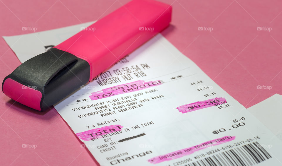 Pink highlighter pen and highlighted items on docket.