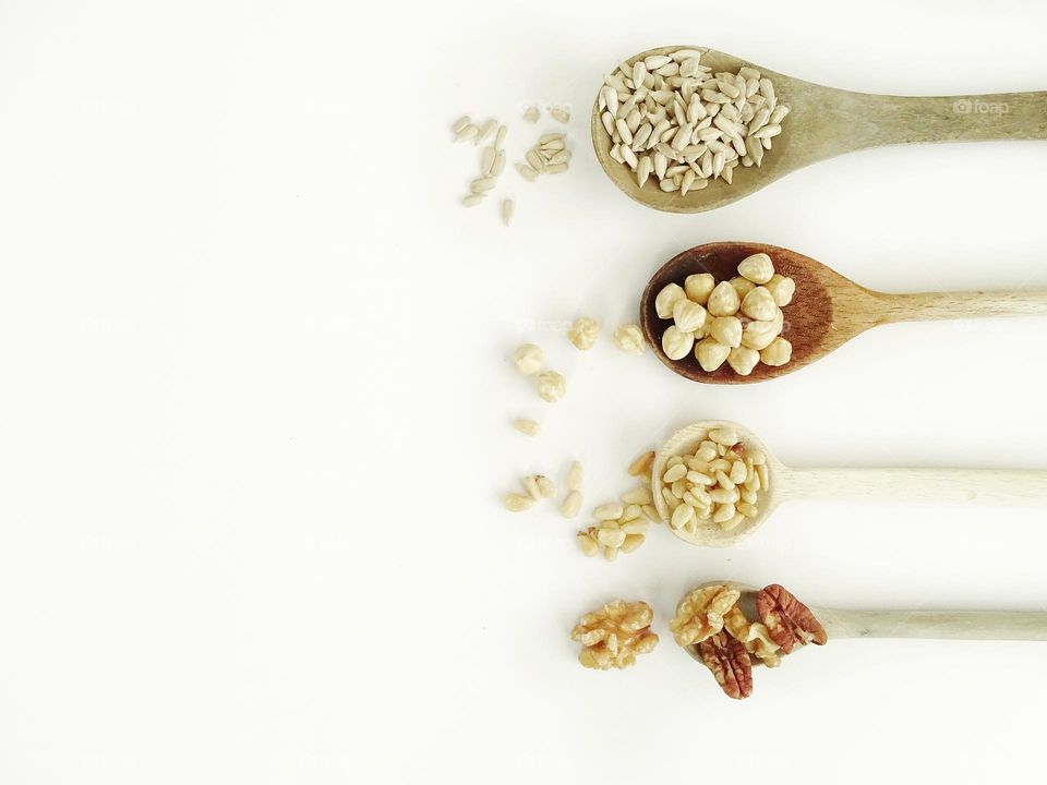 Spoons with seeds and nuts