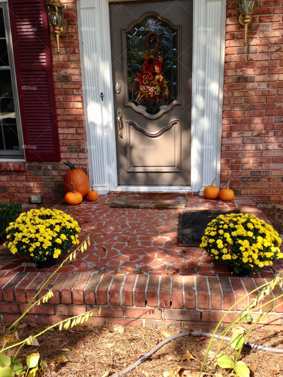 Fall decor on porch.