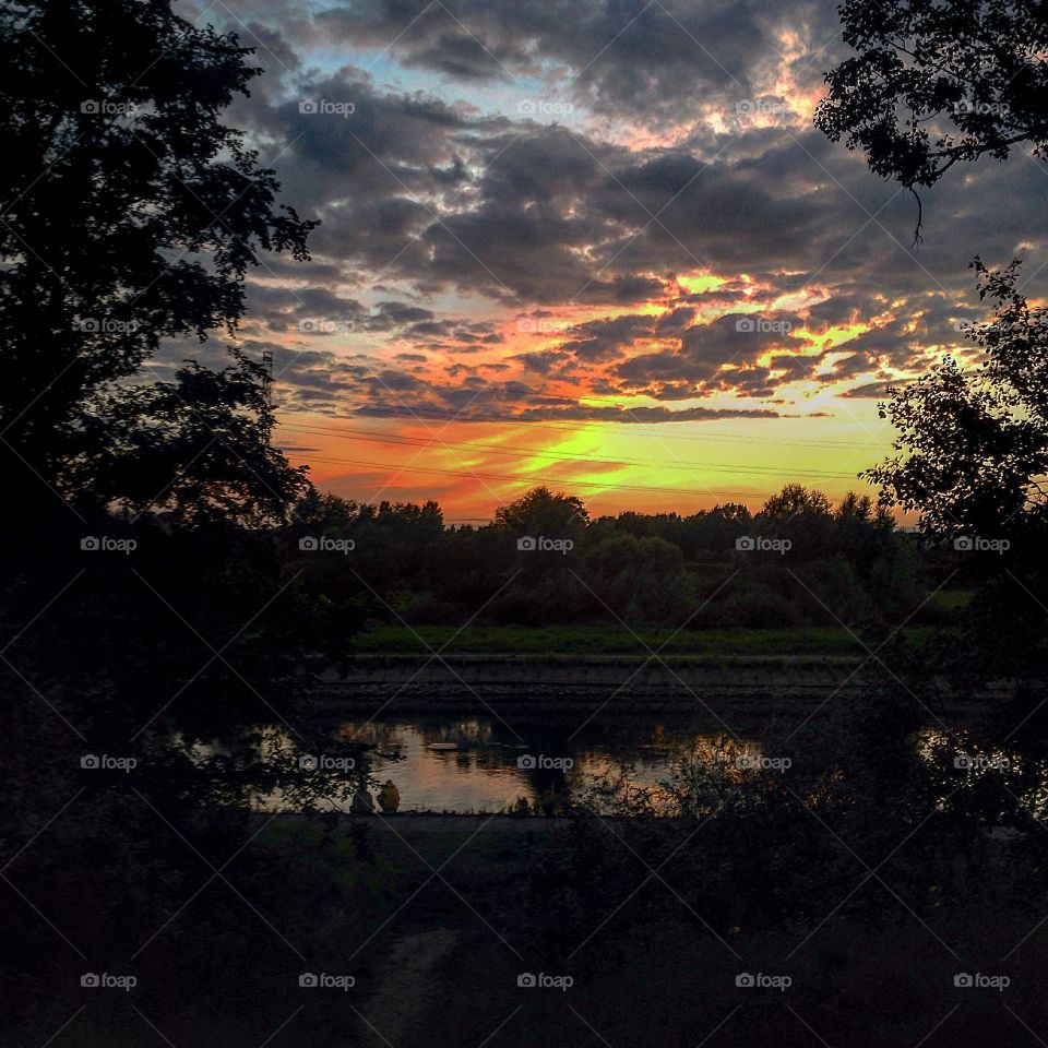 Tequila Sunrise. Just a spontanius pic taken at the romantic walk with my fiance:) the river is named Warta and it's located in Poznań,PL