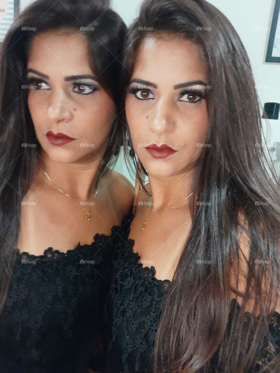 beautiful woman leaning on the mirror