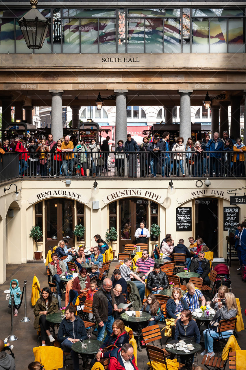 People enjoy day out in Covent Garden Market. London. UK.