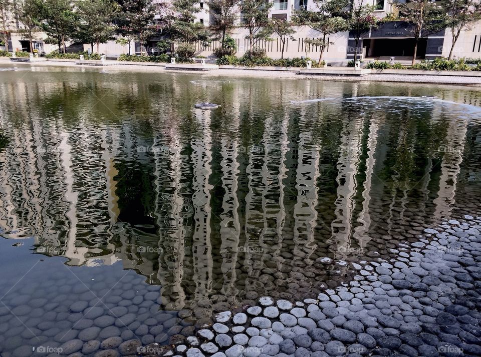 Reflection of buildings on lake