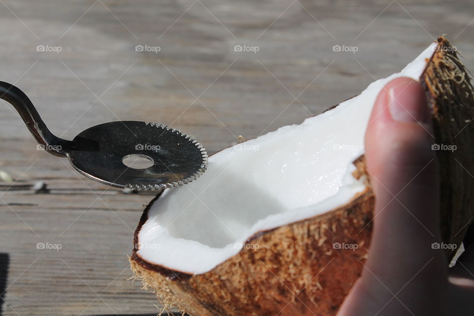 Grinding a coconut