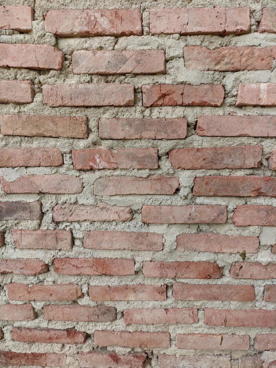 neatly arranged red bricks