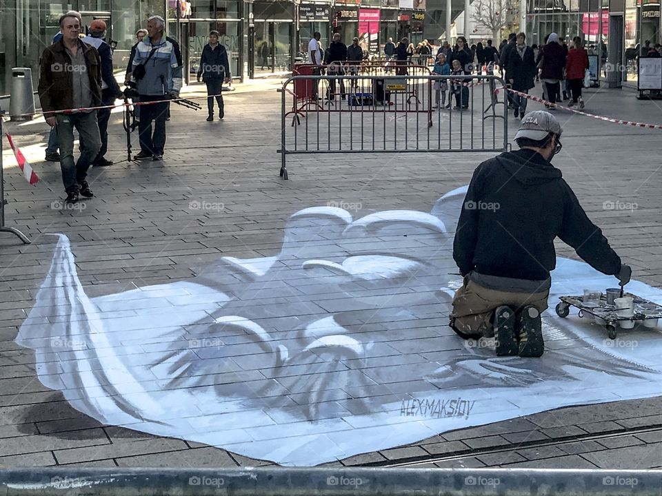 3D art on the floor of the city centre during the art festival 