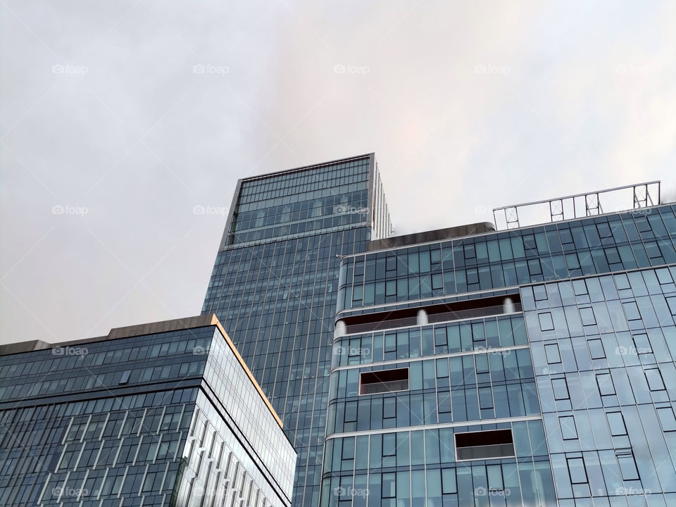 ◇ Modern Buildings on the Background of the Cloudy Sky. Gdansk. Poland. 
◇ Low Angle View.