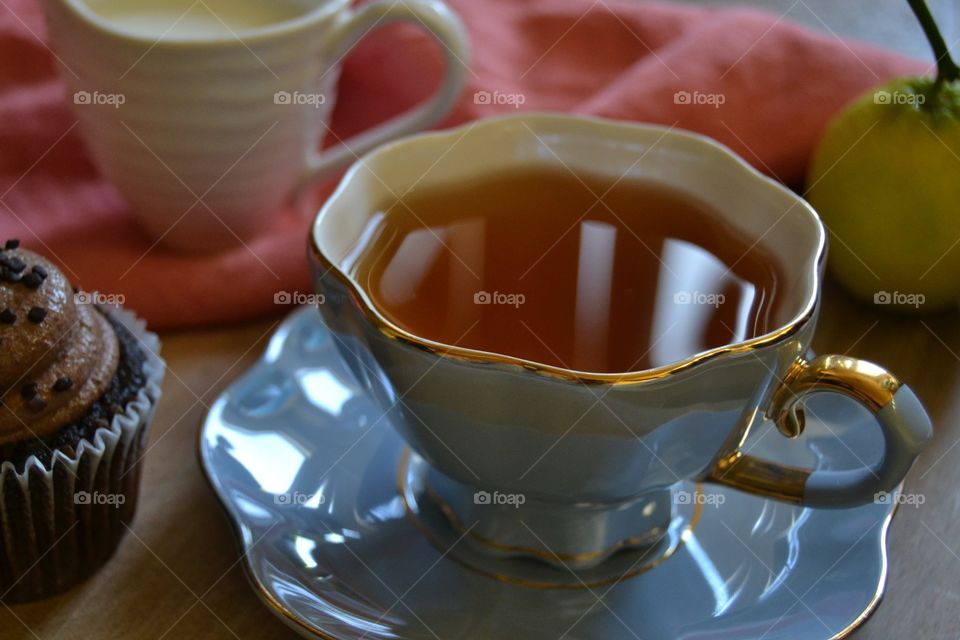 Green tea with a cupcake