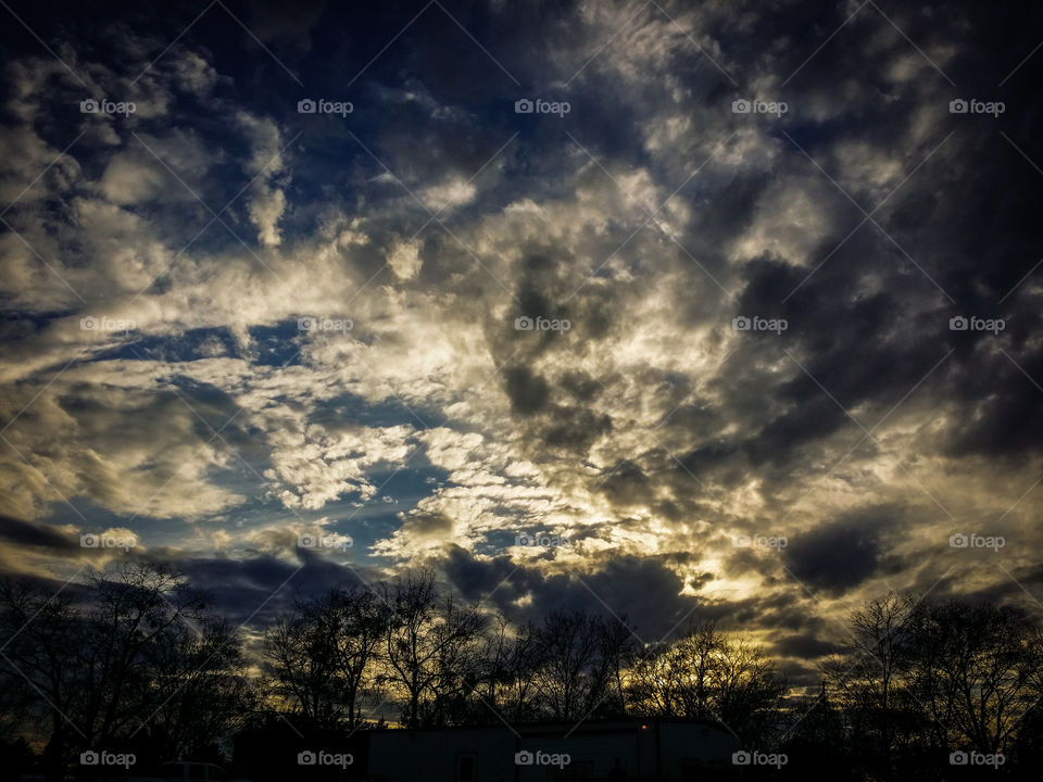 Storm cloud at sunset