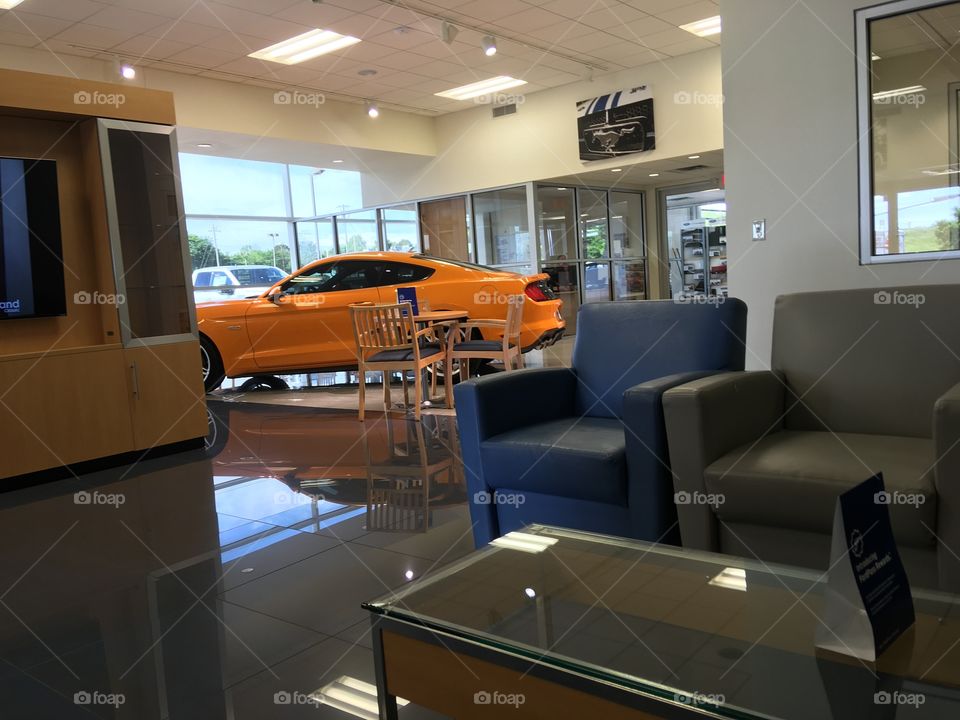 Ford dealership looking at a brand spanking new Ford Mustang. Not fond of the color 