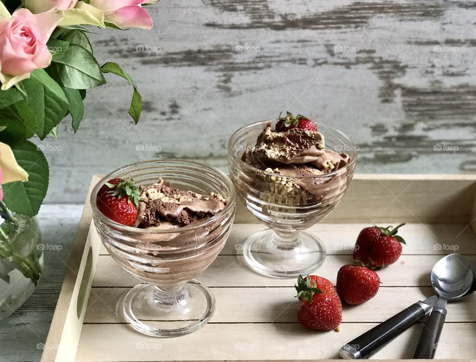 Ice creams on wooden tray