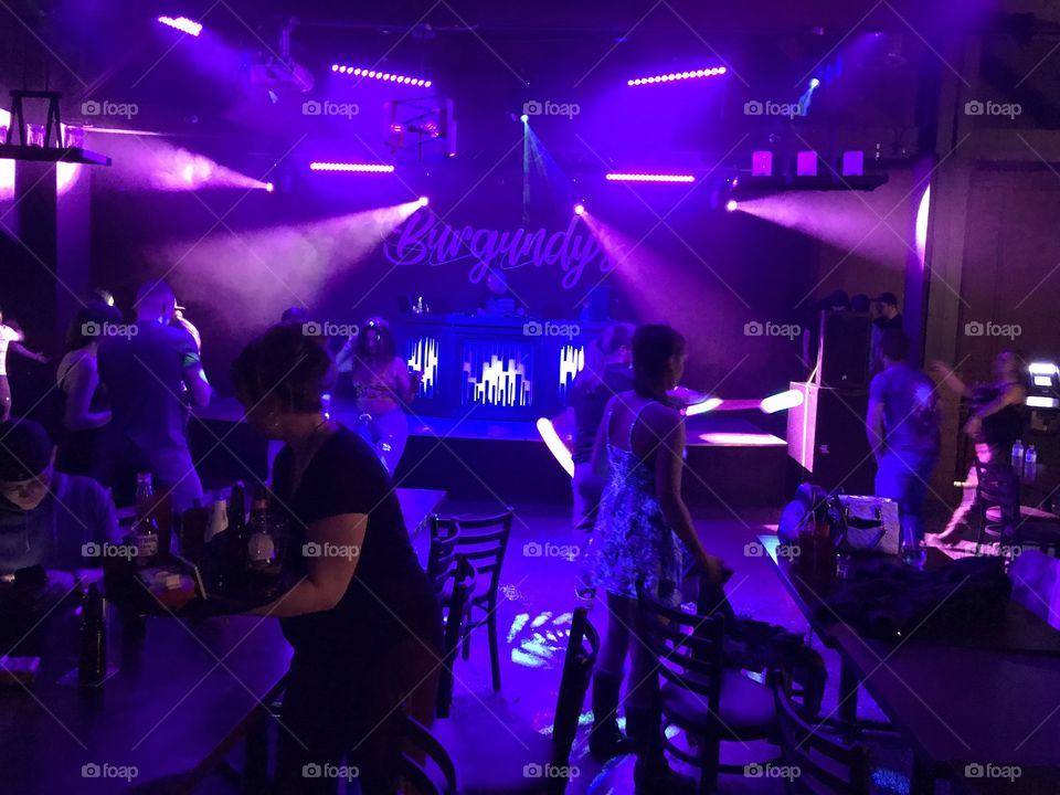 A DJ, dancing, and a light show at Burgundy’s in Red Deer.