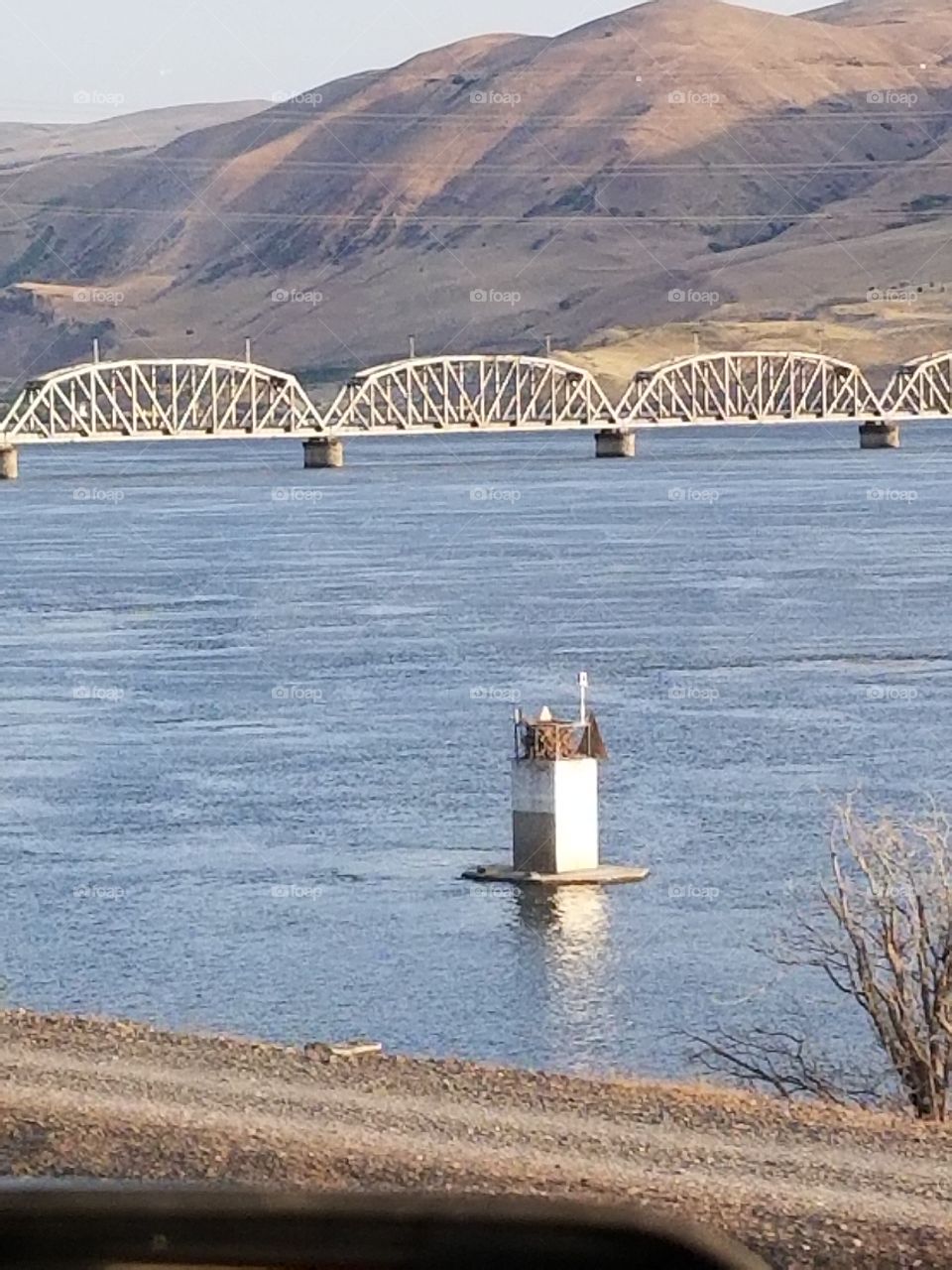 bridge and little house on water