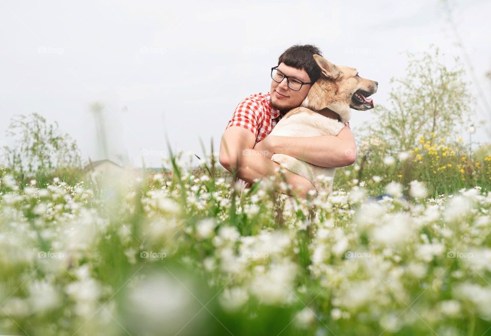 dog and man in spring