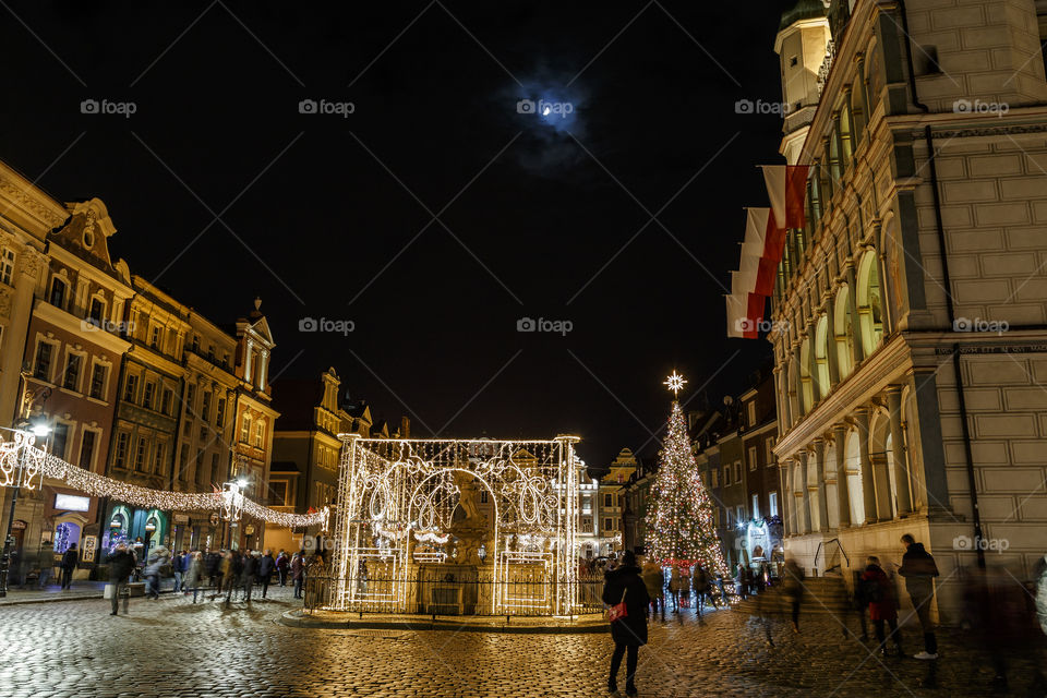 Moon, Christmas tree nad Christmas illumination in Poznan Old Market