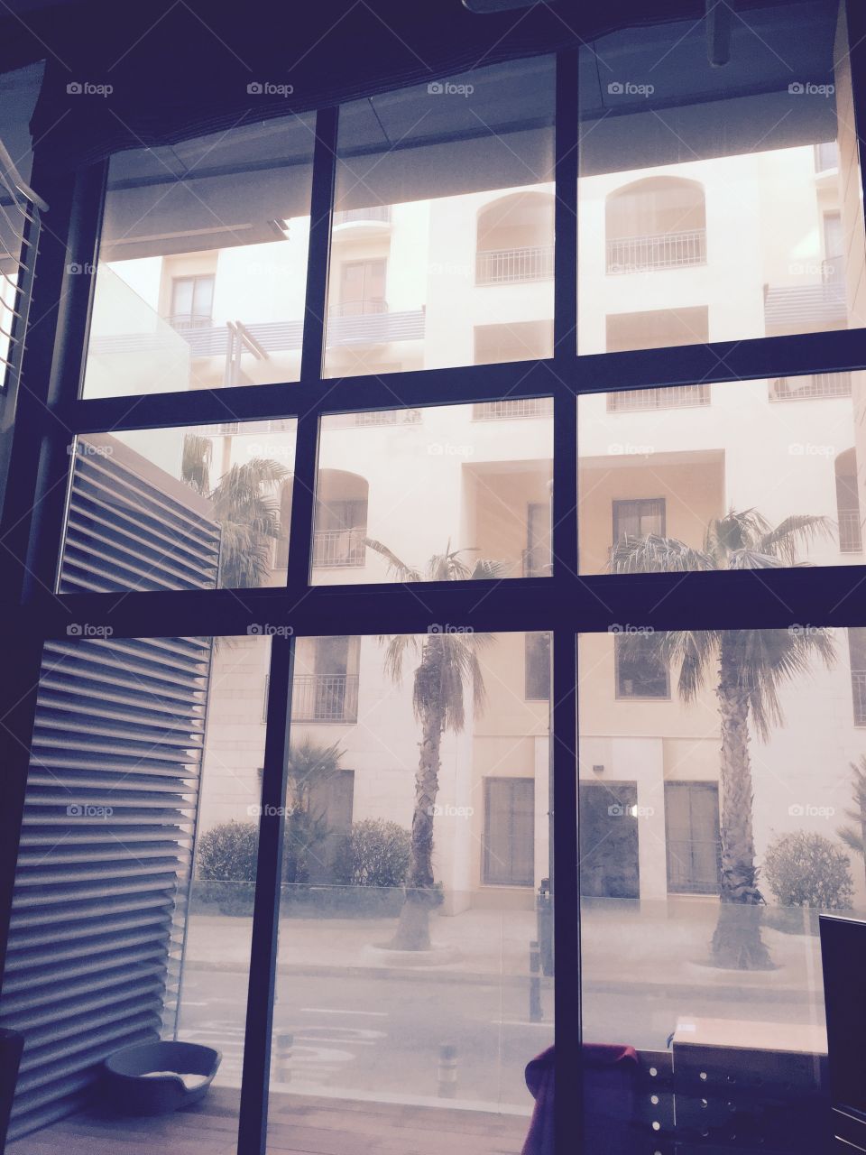 Windows around the World. Double height window in a duplex apartment in Portomaso, San Giljan, Malta.