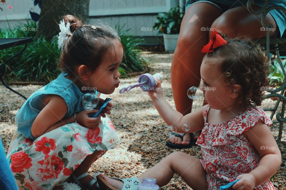 Bubbles. . Family time is very important in my family. The little girl on the left is Jayda, and Paisley is on the right; cousins.