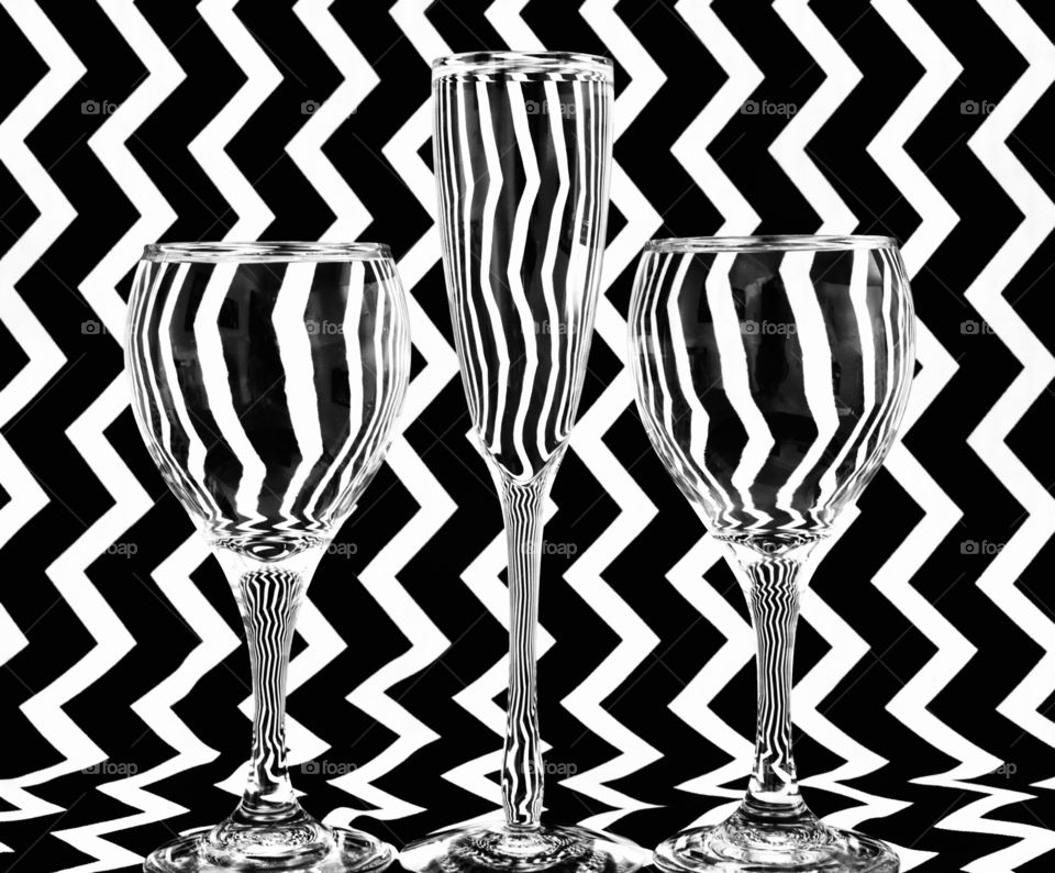 Symmetry, glasses against a black and white background 